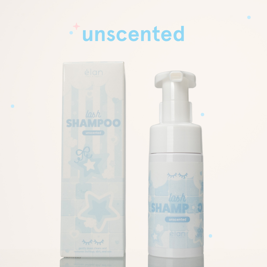 Unscented lash shampoo next to its blue-and-white packaging with star illustrations.