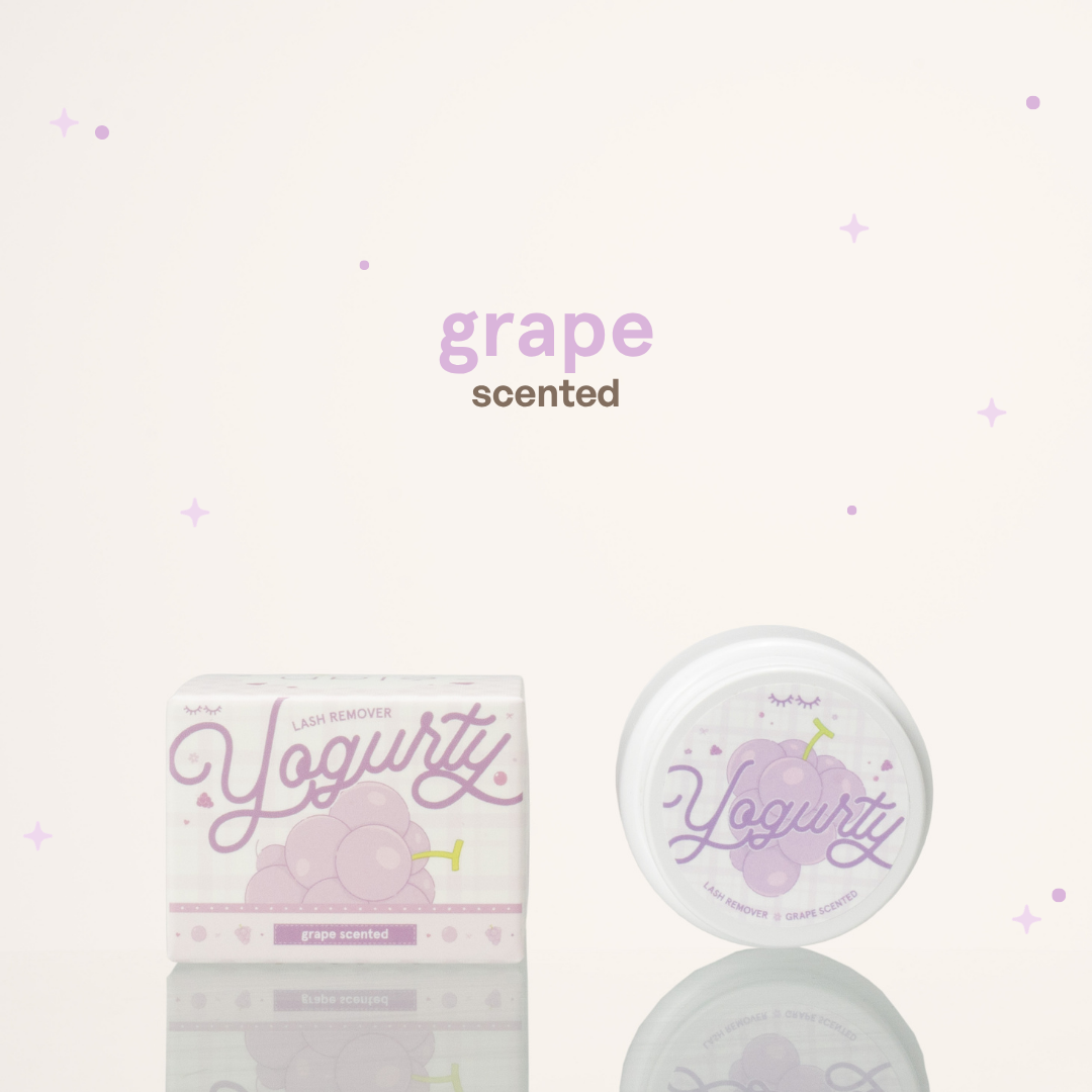 Grape scented yogurty lash remover beside its purple-and-white packaging.