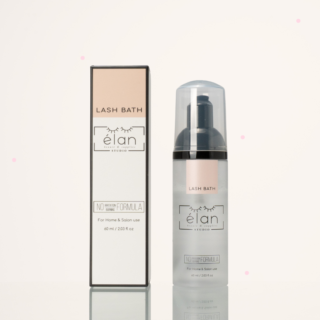 Lash Bath cleanser bottle with matching box packaging, displayed on a soft cream background.