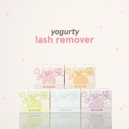 Yogurty lash remover featuring packaging of strawberry, orange, apple, unscented, and grape.
