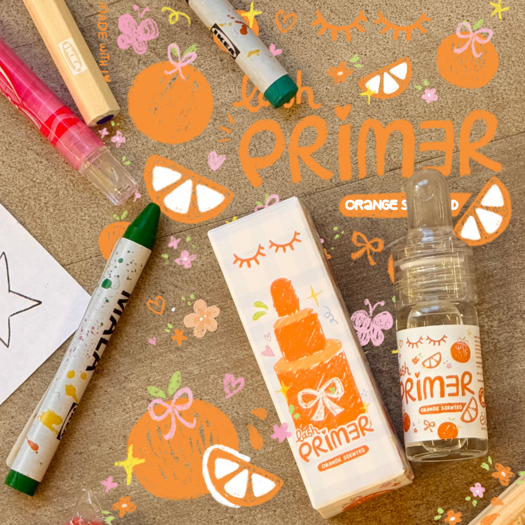 Orange-scented lash primer beside its orange and white packaging surrounded by drawings of oranges and colored pencils.