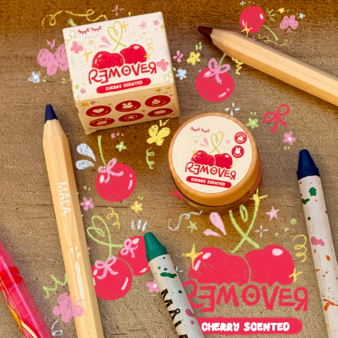 Cherry-scented lash remover surrounded by drawings of cherries, colored pencils, and butterflies.