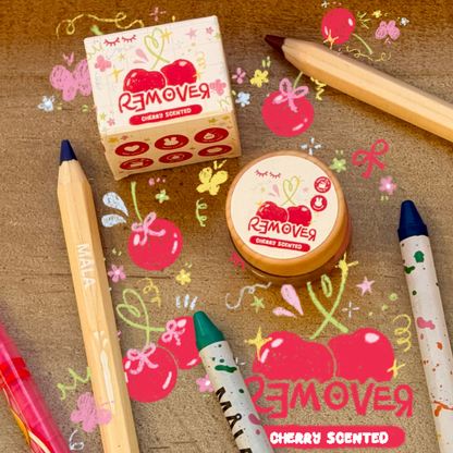 Cherry-scented lash remover surrounded by drawings of cherries, colored pencils, and butterflies.