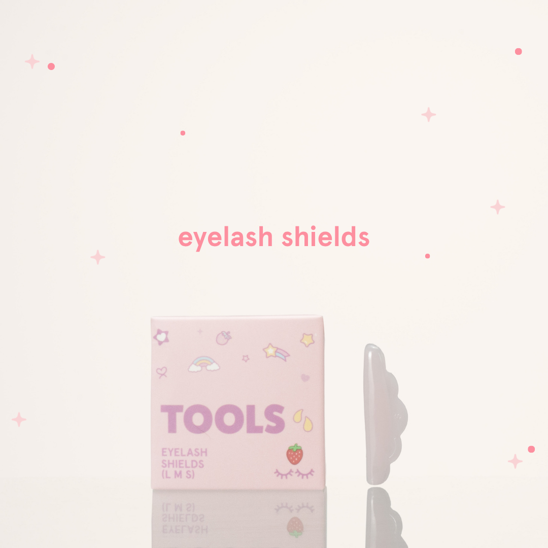 Eyelash shields next to its pink and purple packaging with text saying "Tools Eyelash Shields (L M S)"
