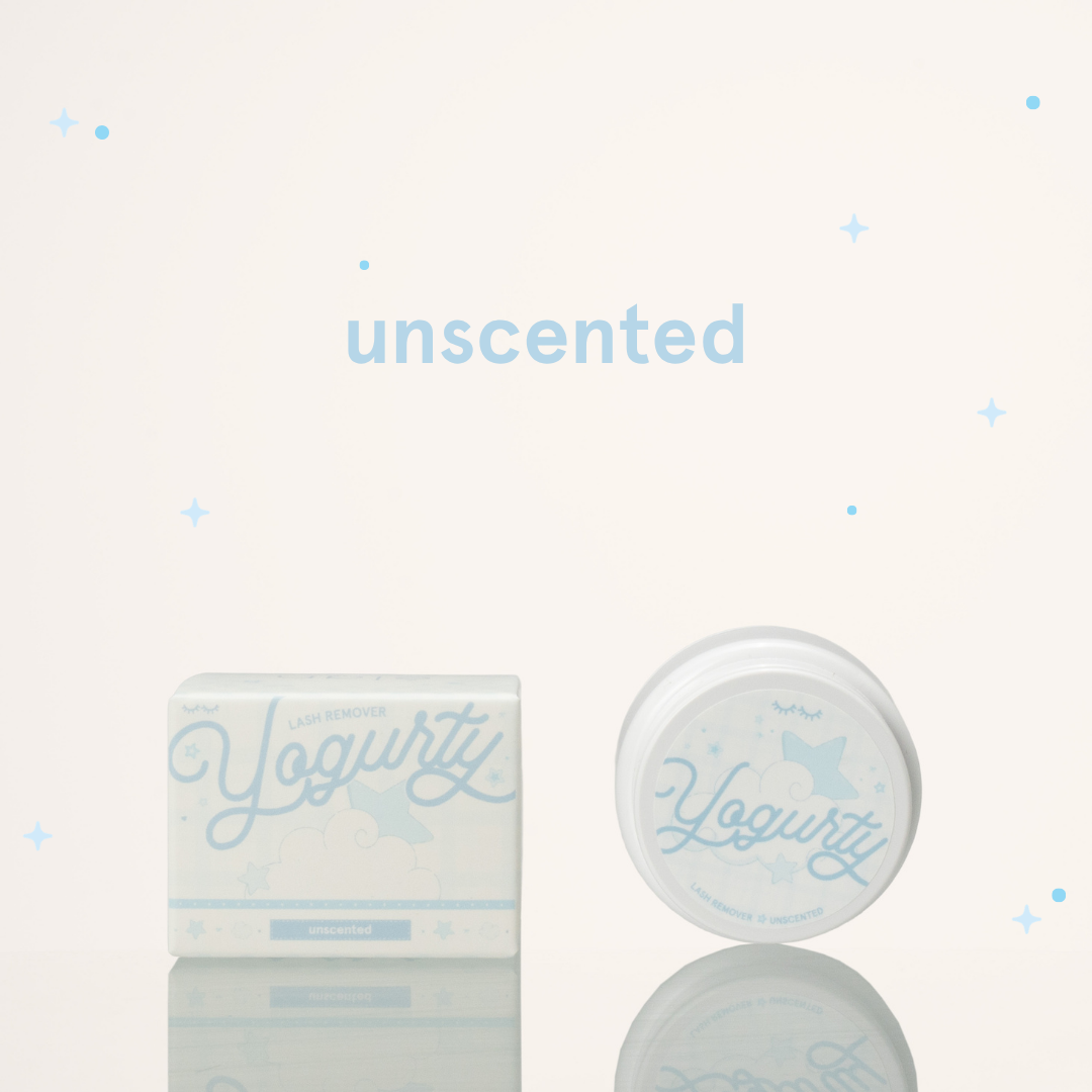Unscented yogurty lash remover beside its blue-and-white packaging.