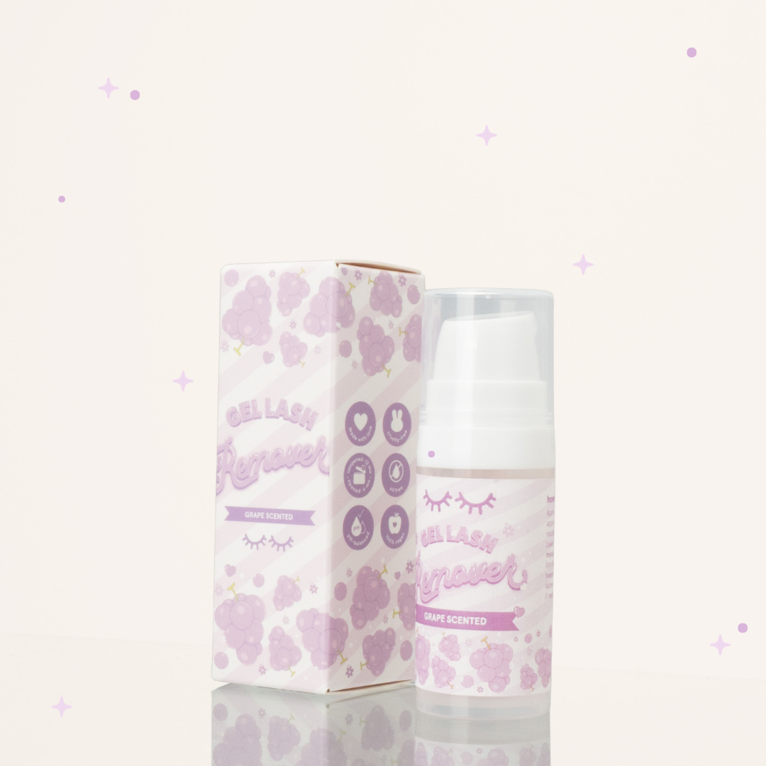 Grape scented gel lash remover in its container next to its purple and white packaging.