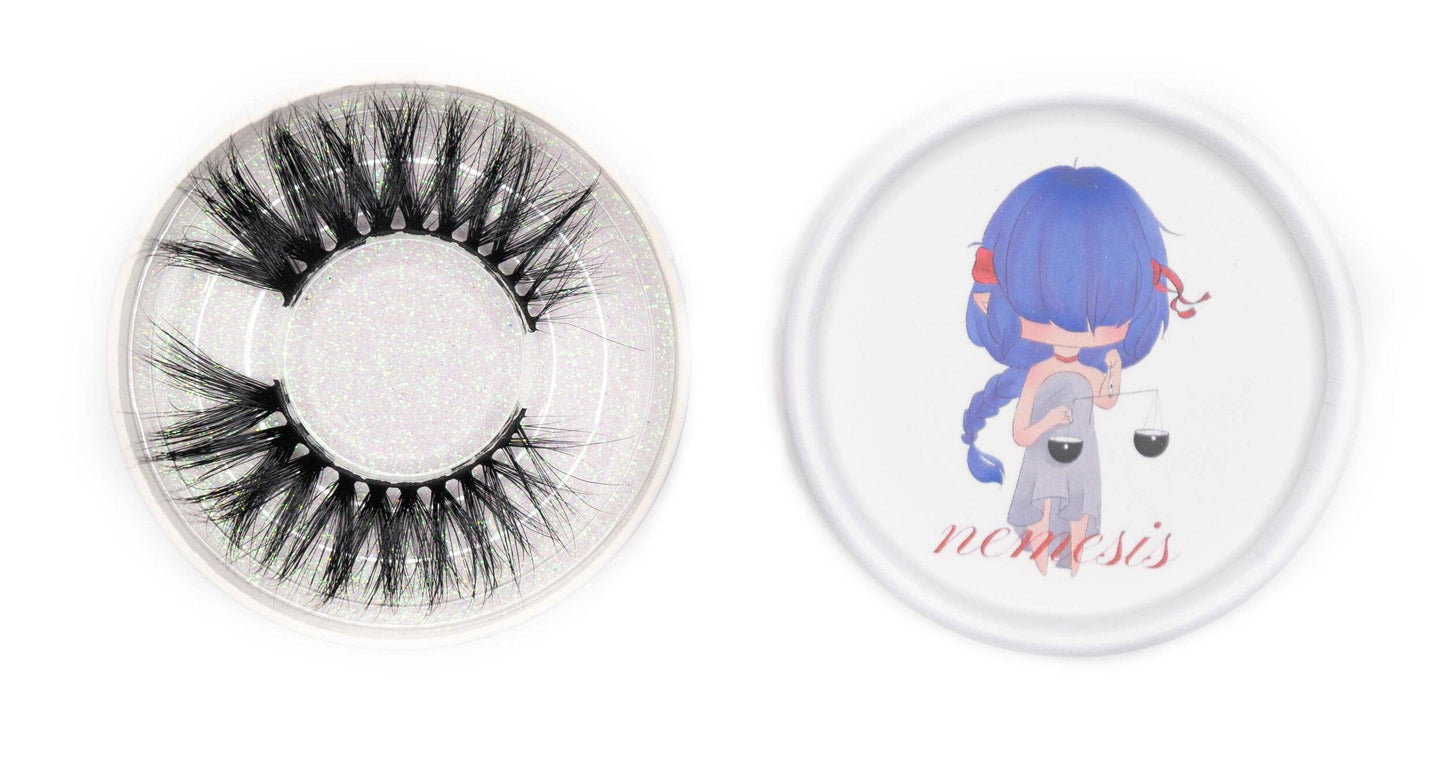 Nemesis false eyelashes in a clear round case beside the illustrated Nemesis product lid on a white background.