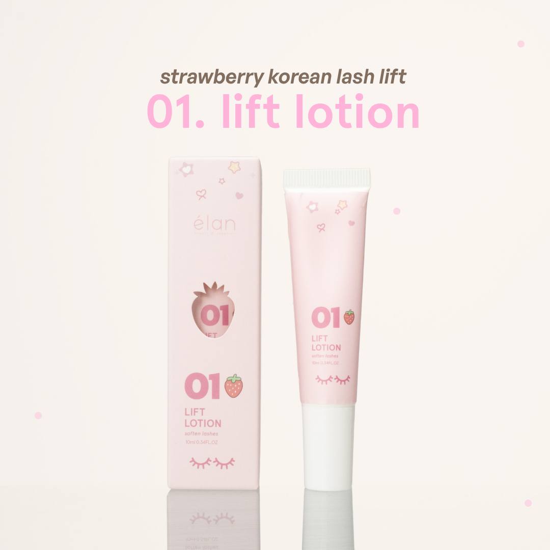 Strawberry Korean Lash Lift 01 Lift Lotion tube next to its pink packaging with strawberry illustrations on it.