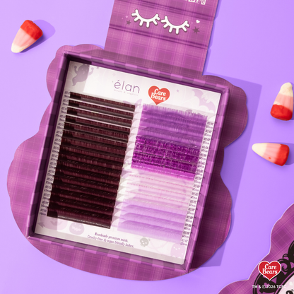 Élan Beauté x Care Bears Share Bear purple Big Boi lash tray featuring warm brown and purple specialty lashes in purple Halloween-themed Care Bears packaging with candy corn accents.