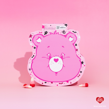 Élan Beauté x Care Bears Cheer Bear Big Boi lash tray in pink Halloween-themed Care Bears packaging with candy corn accents.