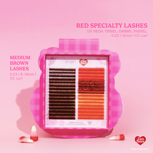 Élan Beauté x Care Bears Cheer Bear red Big Boi lash tray featuring warm brown and red lashes in pink Halloween-themed Care Bears packaging with candy corn accents.