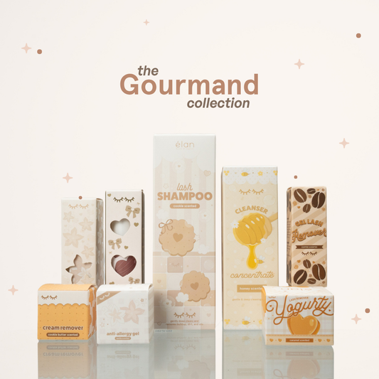 élan beauté the Gourmand collection featuring cookie butter scented cream remover, anti allergy gel, lash shampoo, honey-scented cleanser concentrate, coffee scented gel lash remover, and caramel scented yogurty lash remover. 