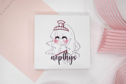 Nepthys false eyelash box featuring an illustrated character on a white and pale pink background.
