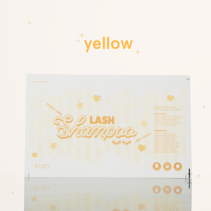 Yellow lash shampoo label featuring a soft pastel bubble design, lash shampoo branding, usage instructions, ingredients, and product icons on a cream background.