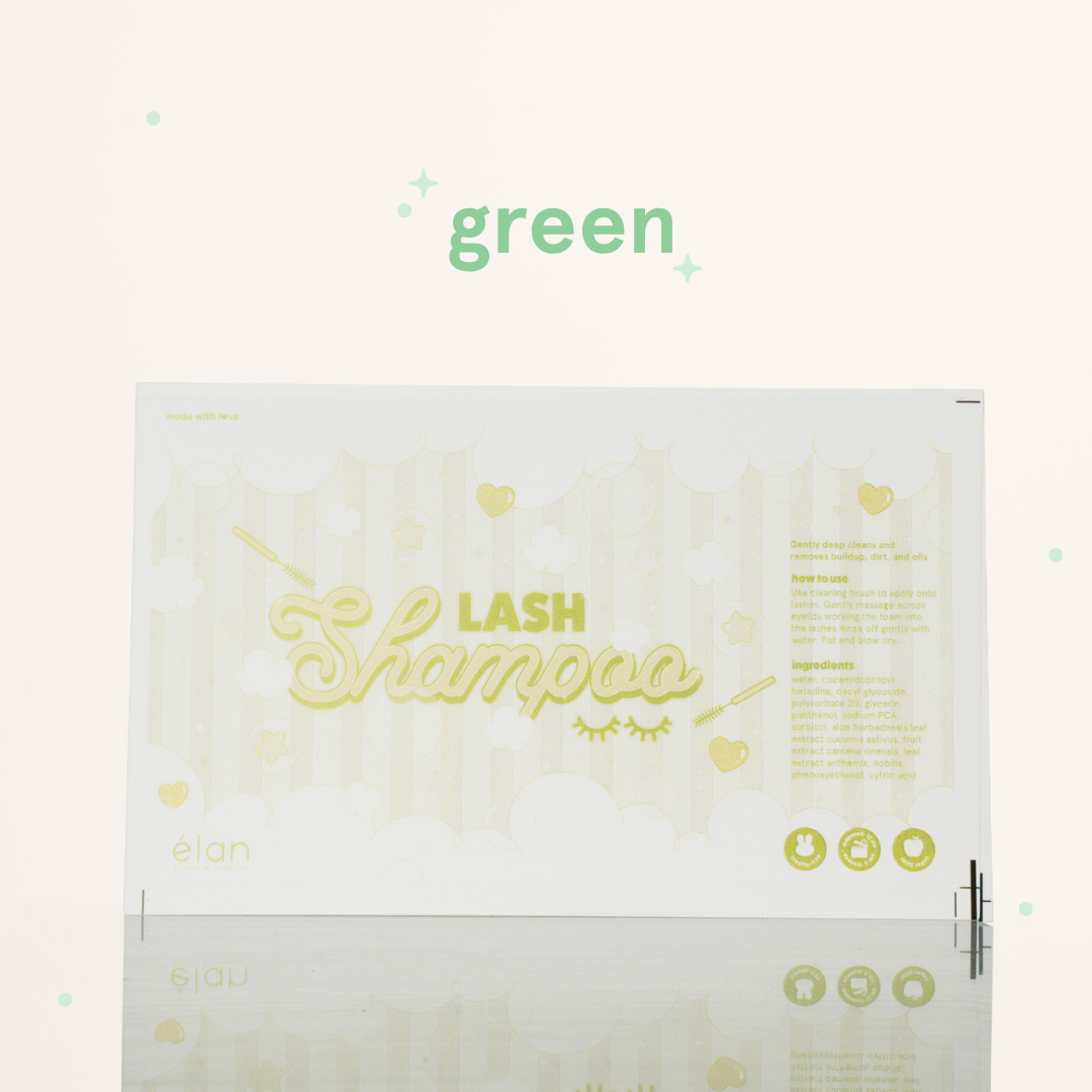 Green lash shampoo label featuring a soft pastel bubble design, lash shampoo branding, usage instructions, ingredients, and product icons on a cream background.