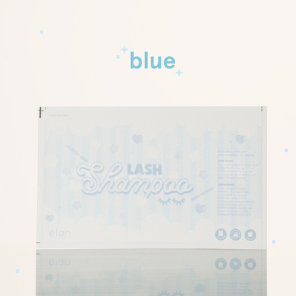 Blue lash shampoo label featuring a soft pastel bubble design, lash shampoo branding, usage instructions, ingredients, and product icons on a cream background.