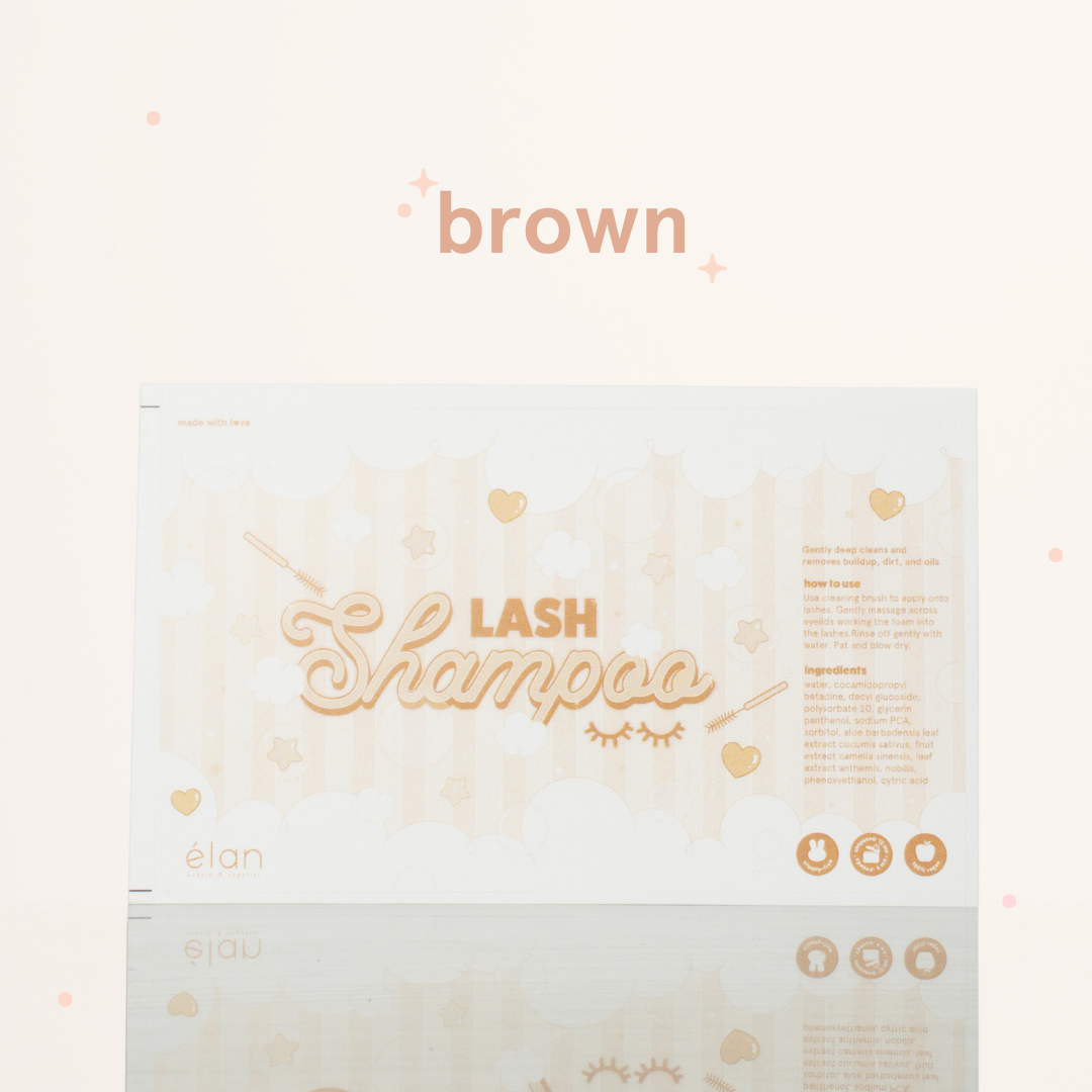Brown lash shampoo label featuring a soft pastel bubble design, lash shampoo branding, usage instructions, ingredients, and product icons on a cream background.