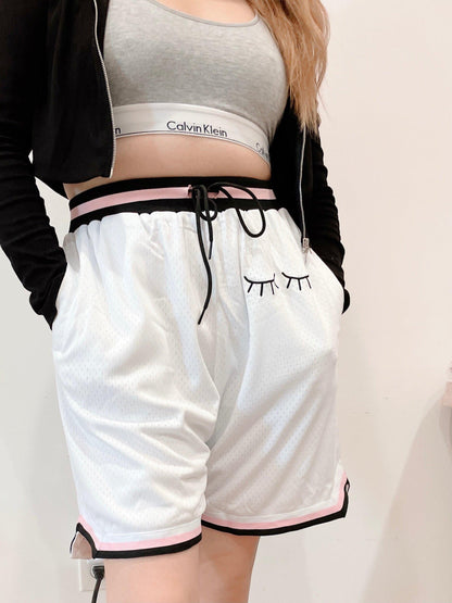 white embroidered basketball shorts