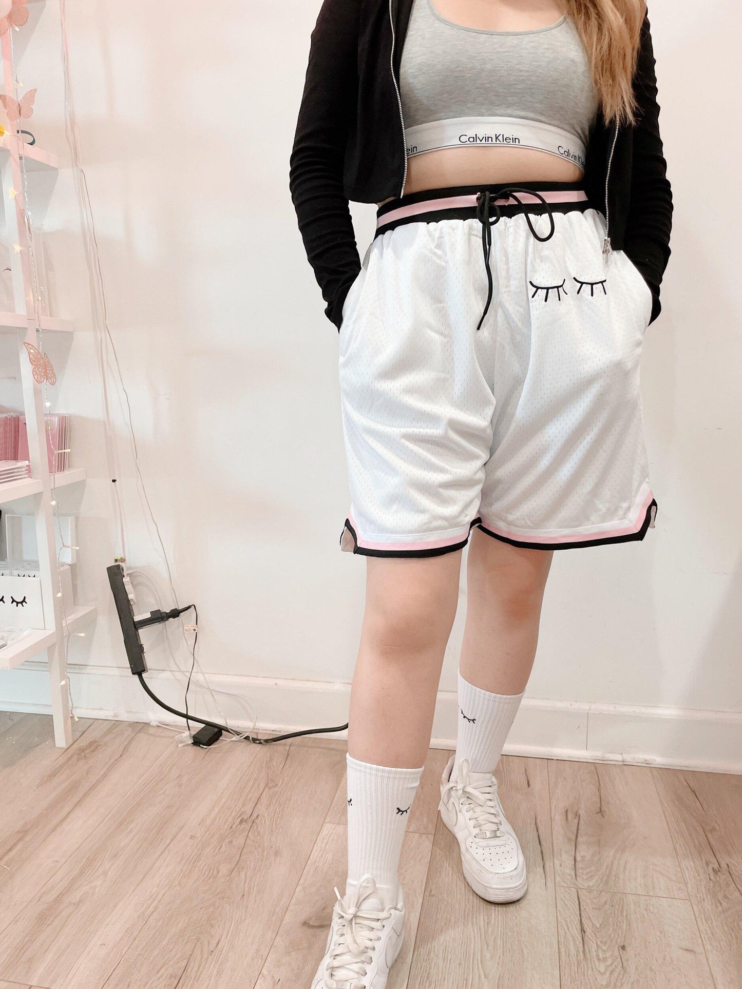 white embroidered basketball shorts