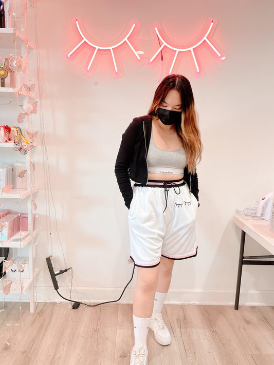 white embroidered basketball shorts