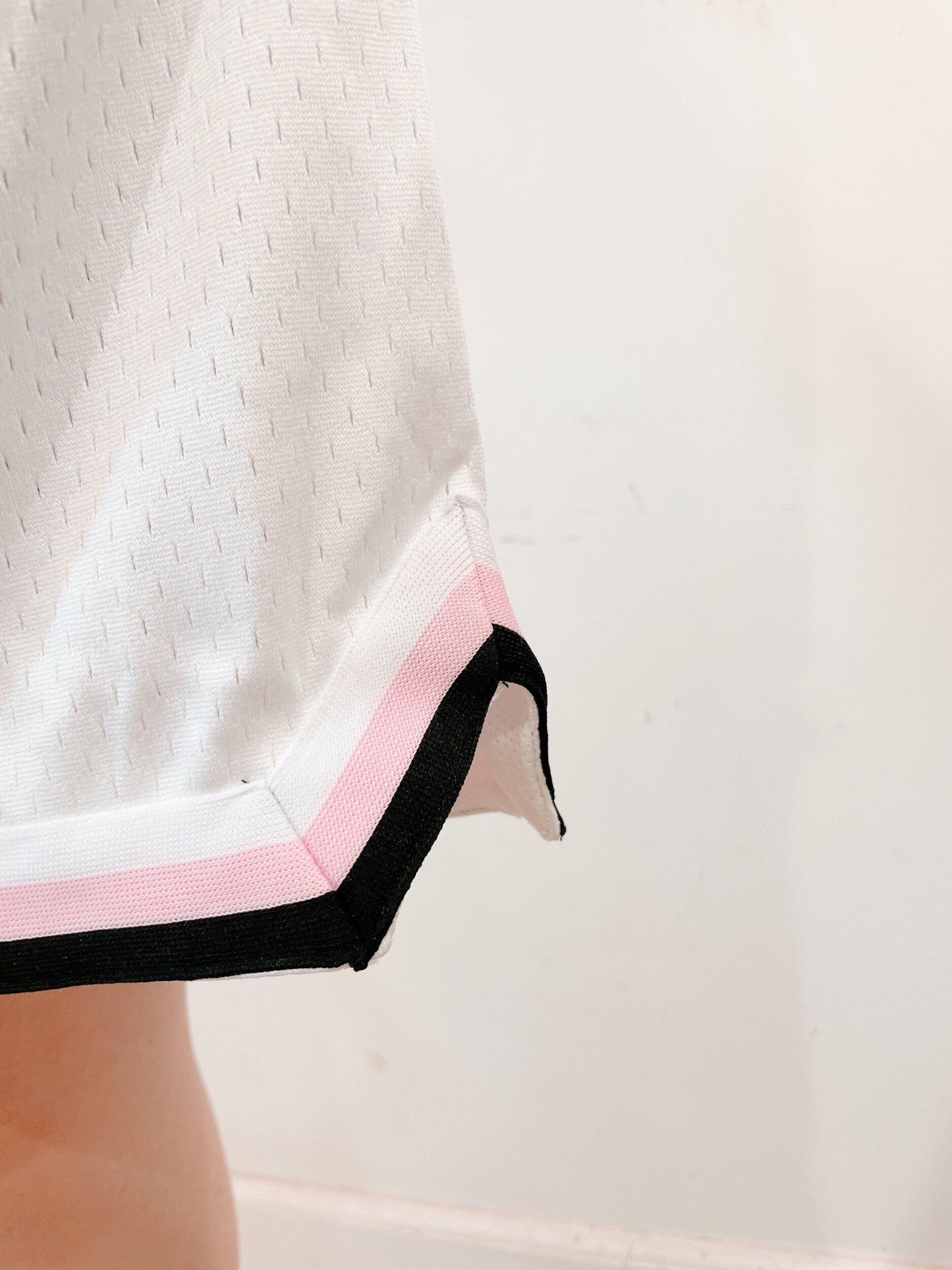 white embroidered basketball shorts